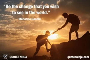 One person helping other while mountain climbing