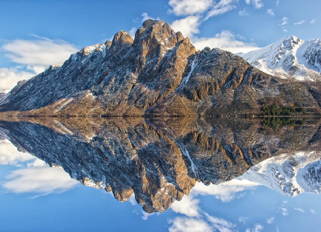 Mountain mirror image in lake