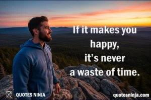 A man at a top of mountain staring forest