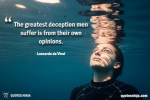 A Girl submerged beneath the surface, looking up toward the waterline.