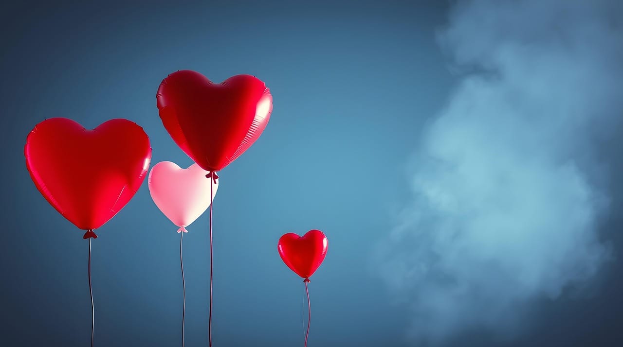 Heart shaped balloons in the sky
